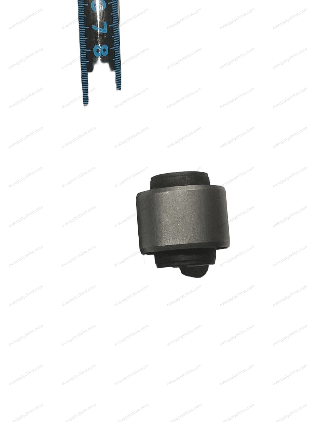 Shock absorber under bushing